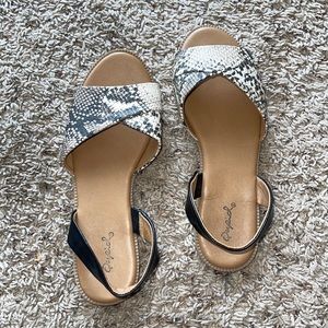 Snake print open toed flats